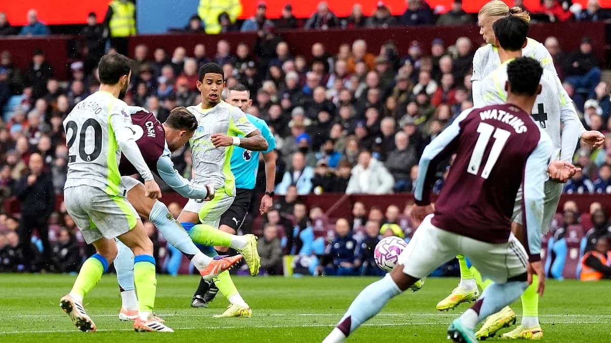 Manchester City player shoots during match Manchester City player shoots during match