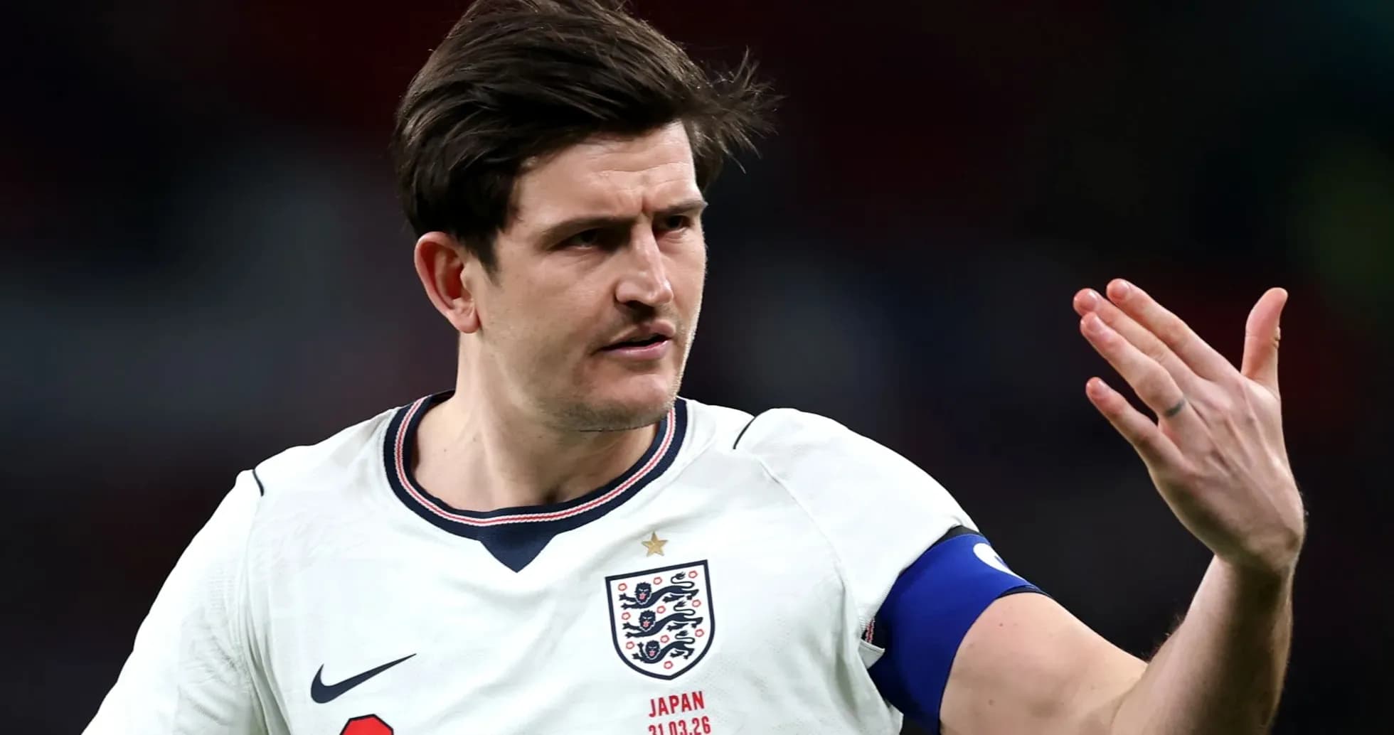 Player gesturing during England match in white kit Player gesturing during England match in white kit