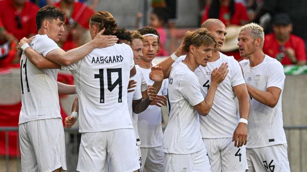 Players celebrating after scoring a goal together Players celebrating after scoring a goal together