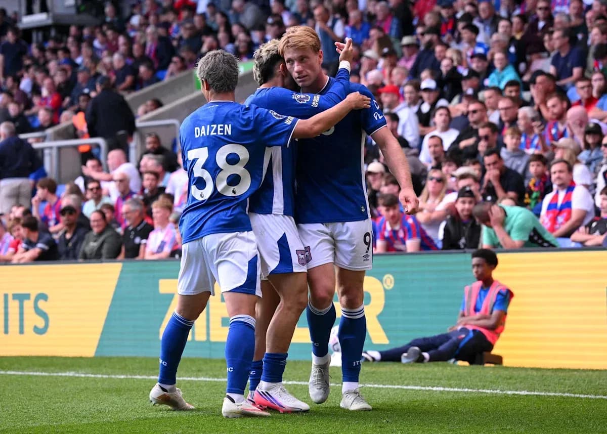 Players celebrating a goal during match Players celebrating a goal during match