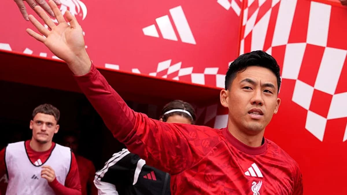 Player waving while entering the stadium tunnel Player waving while entering the stadium tunnel