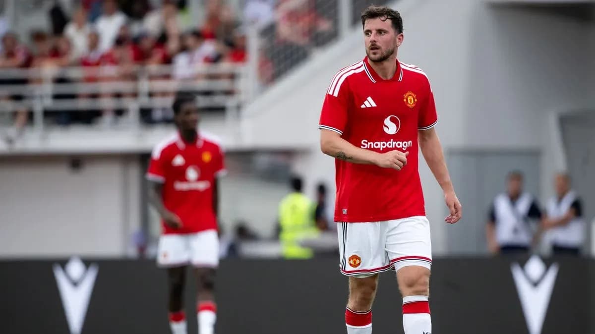 Manchester United player walking on the pitch Manchester United player walking on the pitch