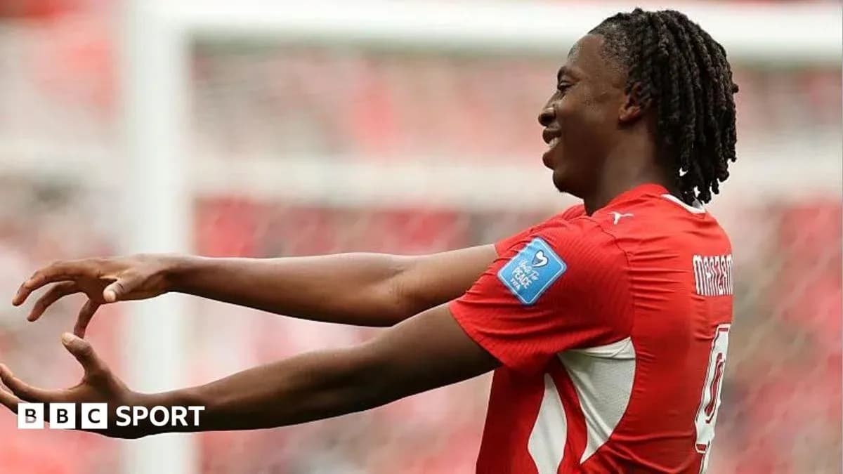 Player celebrating during a football match Player celebrating during a football match