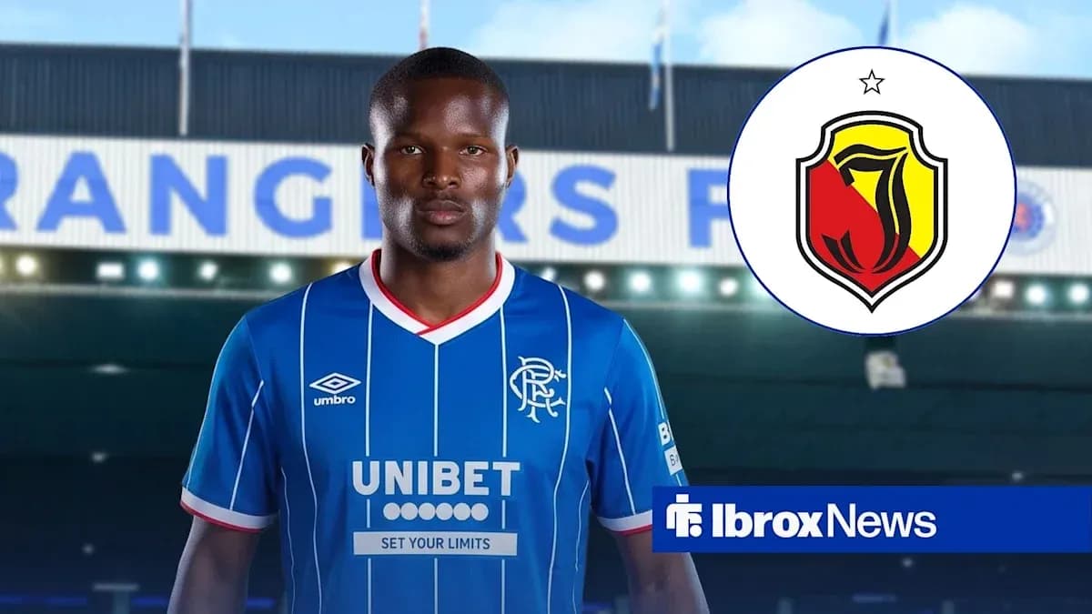 Player in blue Rangers jersey with club logo background Player in blue Rangers jersey with club logo background