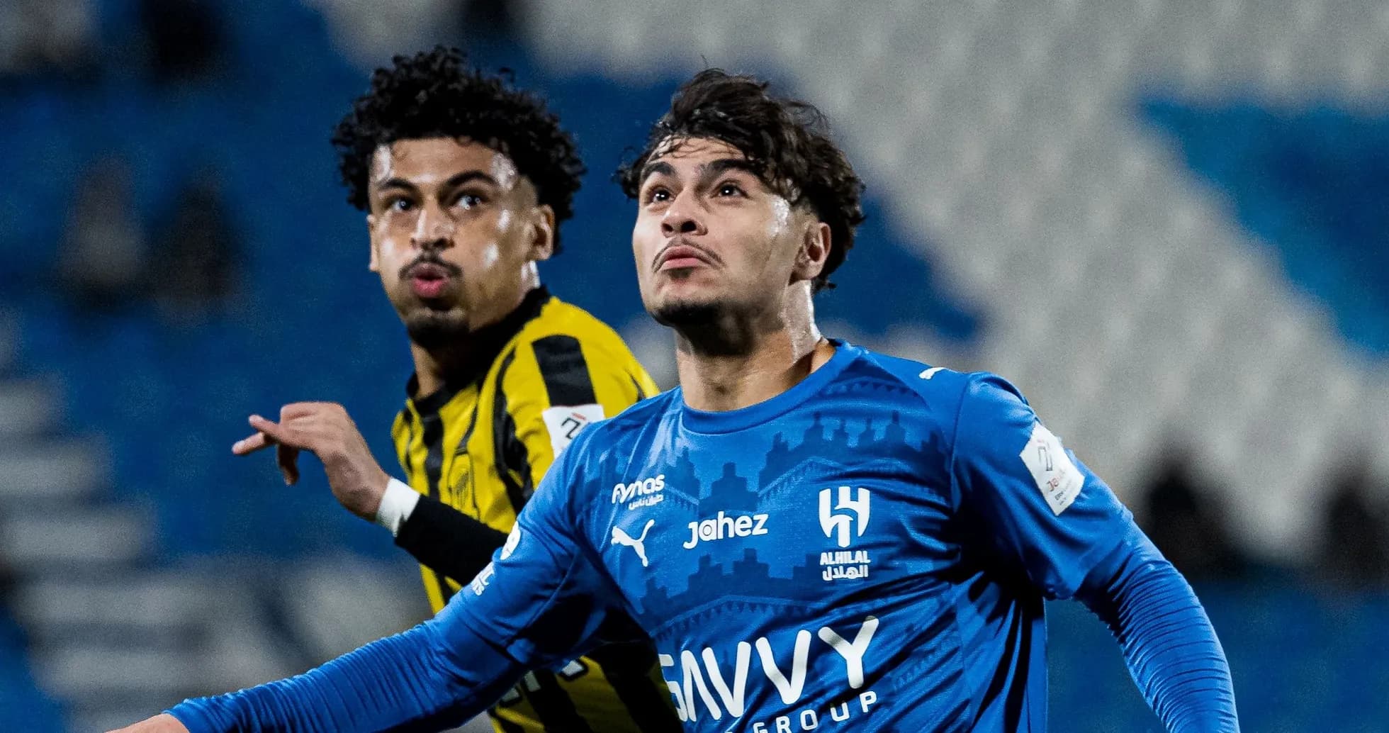 Players from Al Hilal and Ittihad competing for the ball Players from Al Hilal and Ittihad competing for the ball