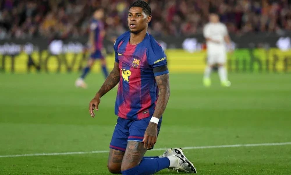 Barcelona player kneeling on the pitch during match Barcelona player kneeling on the pitch during match