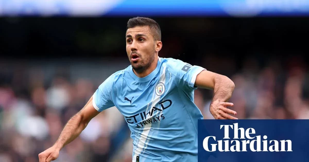 Player celebrating during a match wearing Manchester City jersey Player celebrating during a match wearing Manchester City jersey
