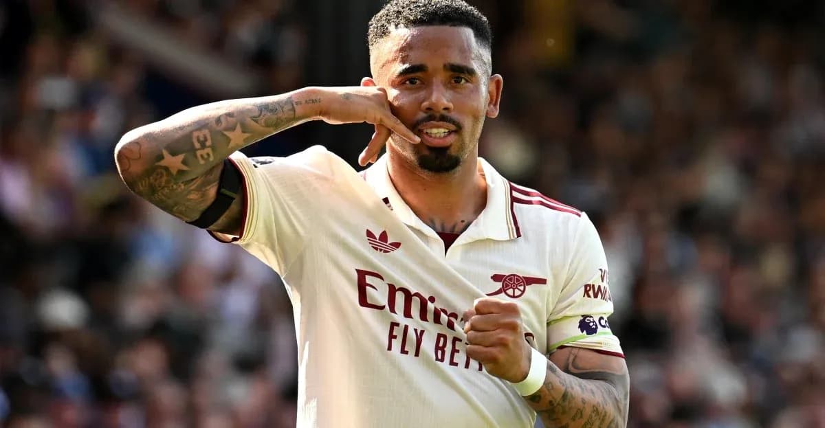 Player celebrating with phone gesture after scoring Player celebrating with phone gesture after scoring