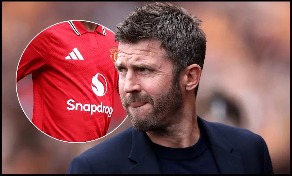Football coach observing match with Manchester United shirt Football coach observing match with Manchester United shirt