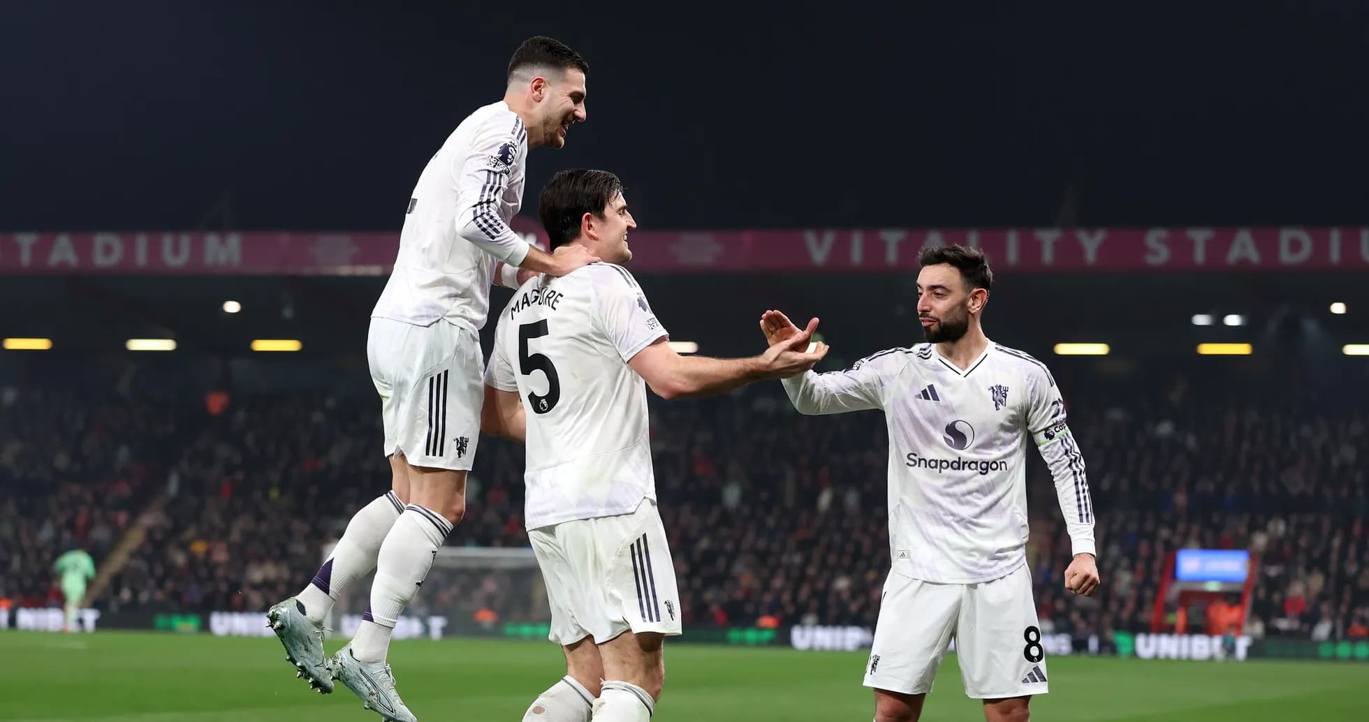 Players celebrating a goal at Vitality Stadium Players celebrating a goal at Vitality Stadium