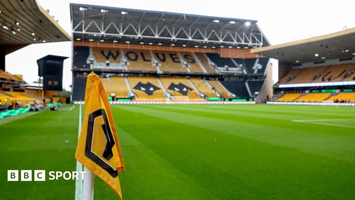 Wolverhampton stadium with corner flag in foreground Wolverhampton stadium with corner flag in foreground