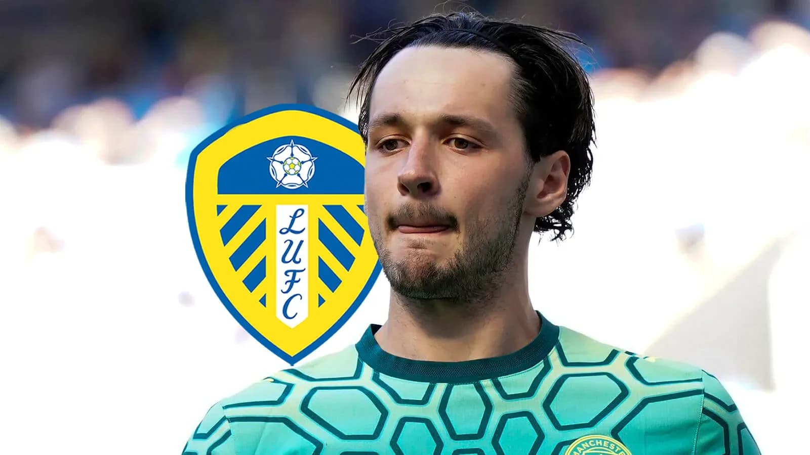 Goalkeeper in green kit with Leeds United logo Goalkeeper in green kit with Leeds United logo