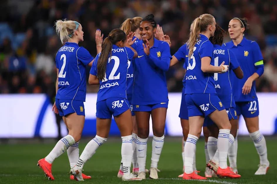 Team celebrating after scoring a goal during match Team celebrating after scoring a goal during match