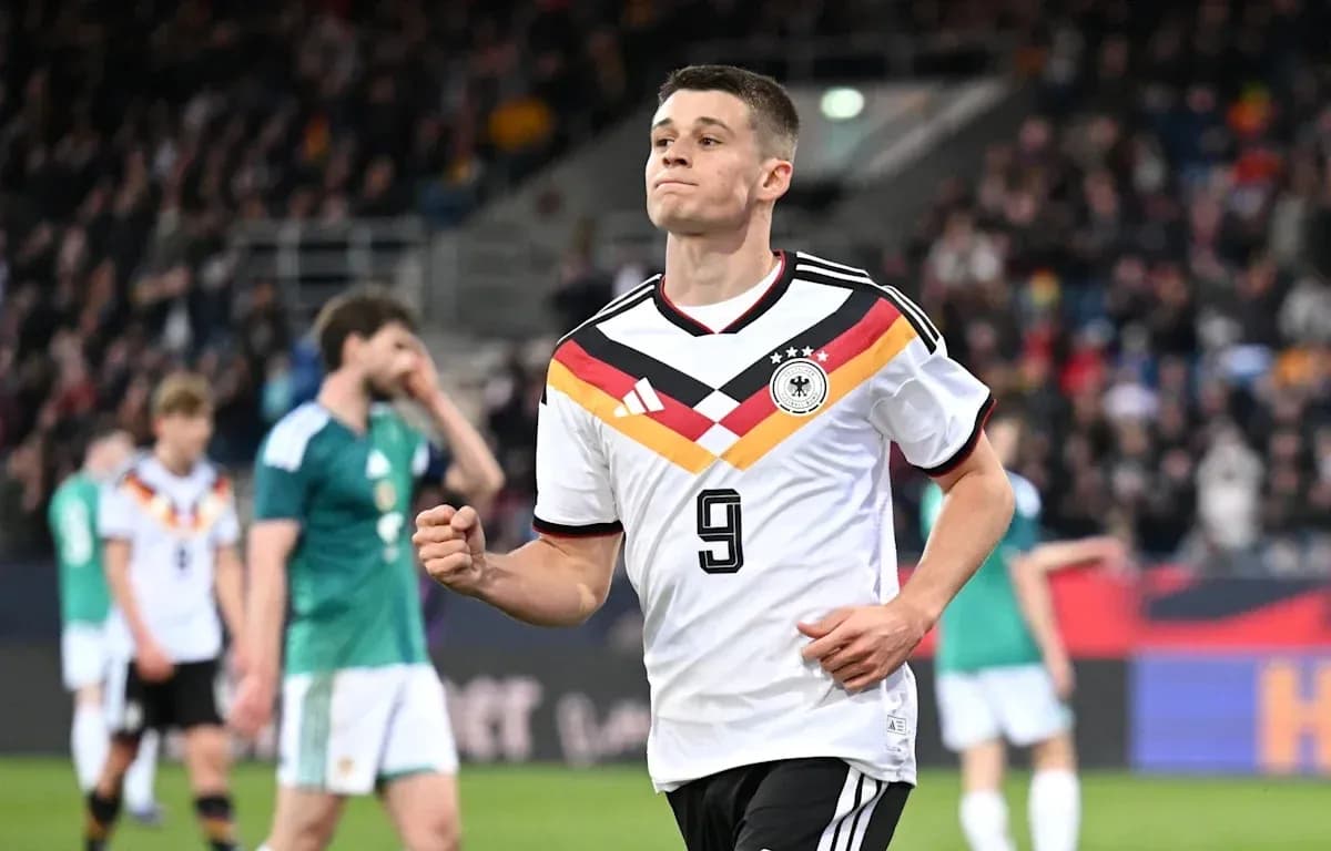 Player in Germany jersey celebrating a goal Player in Germany jersey celebrating a goal