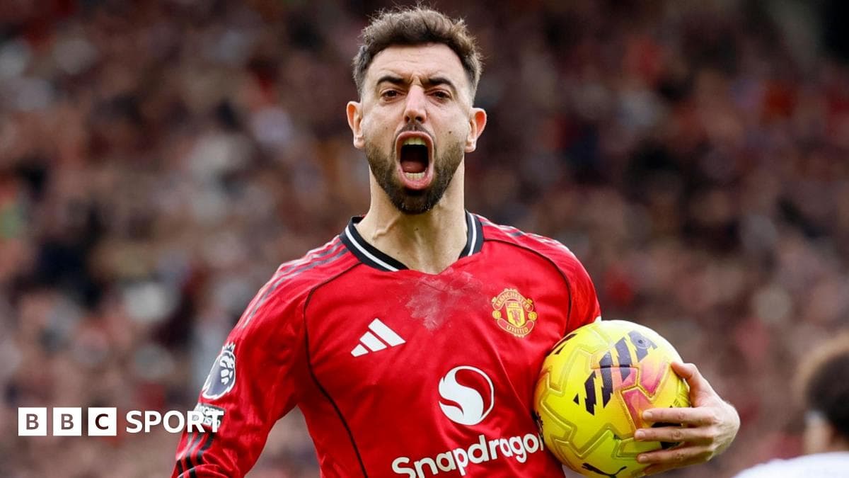Bruno Fernandes celebrating with ball after scoring goal Bruno Fernandes celebrating with ball after scoring goal