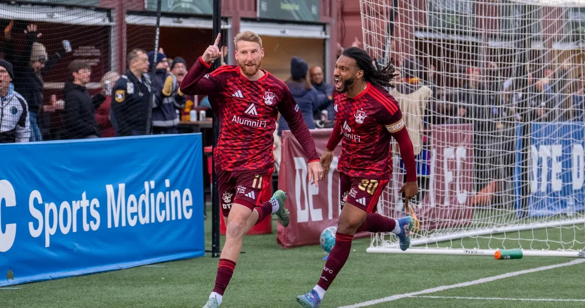 Players celebrating goal during Detroit City match Players celebrating goal during Detroit City match