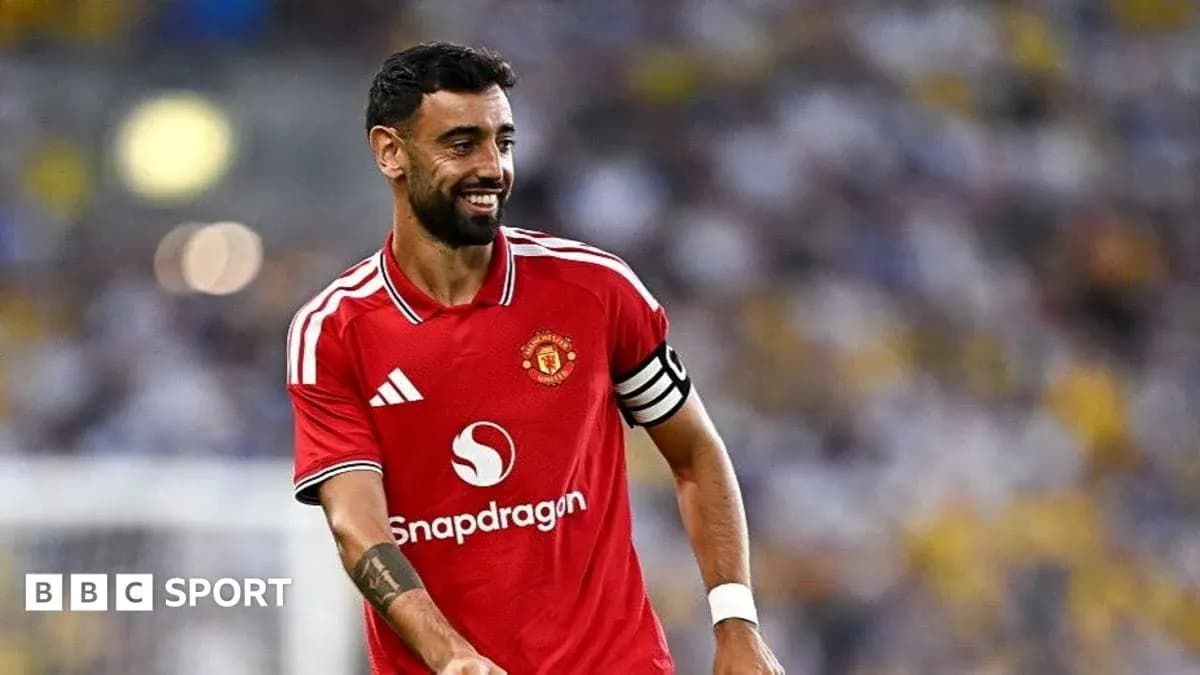 Bruno Fernandes smiling in Manchester United jersey Bruno Fernandes smiling in Manchester United jersey