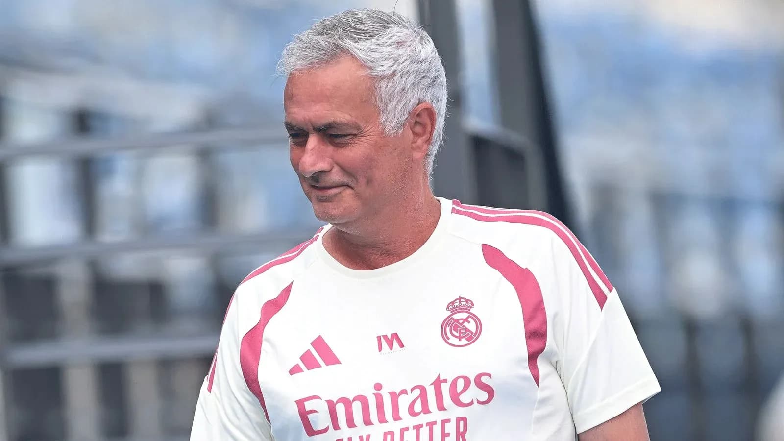 Coach in Real Madrid training kit on the field Coach in Real Madrid training kit on the field