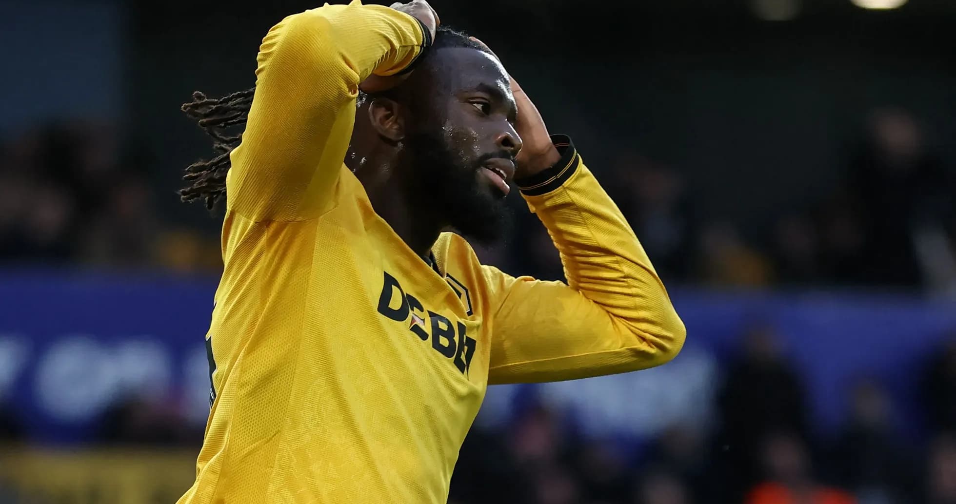 Player in yellow jersey reacting during match Player in yellow jersey reacting during match