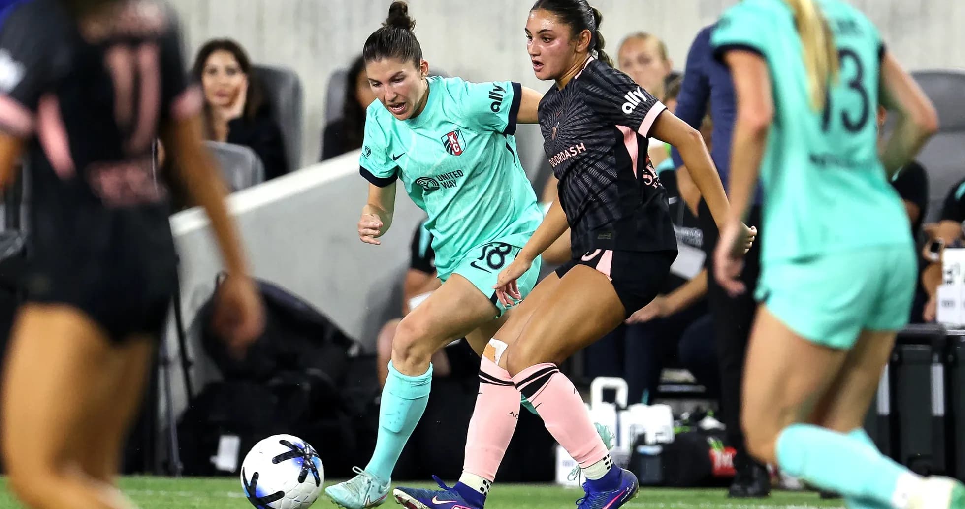Players competing for the ball during match Players competing for the ball during match