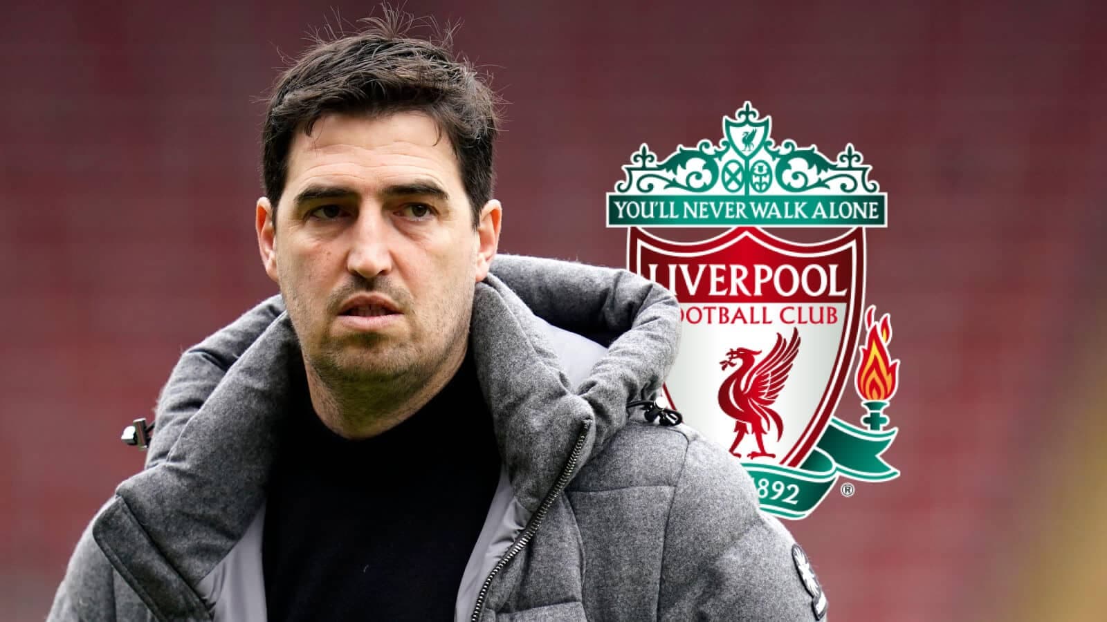 Coach in front of Liverpool FC logo Coach in front of Liverpool FC logo