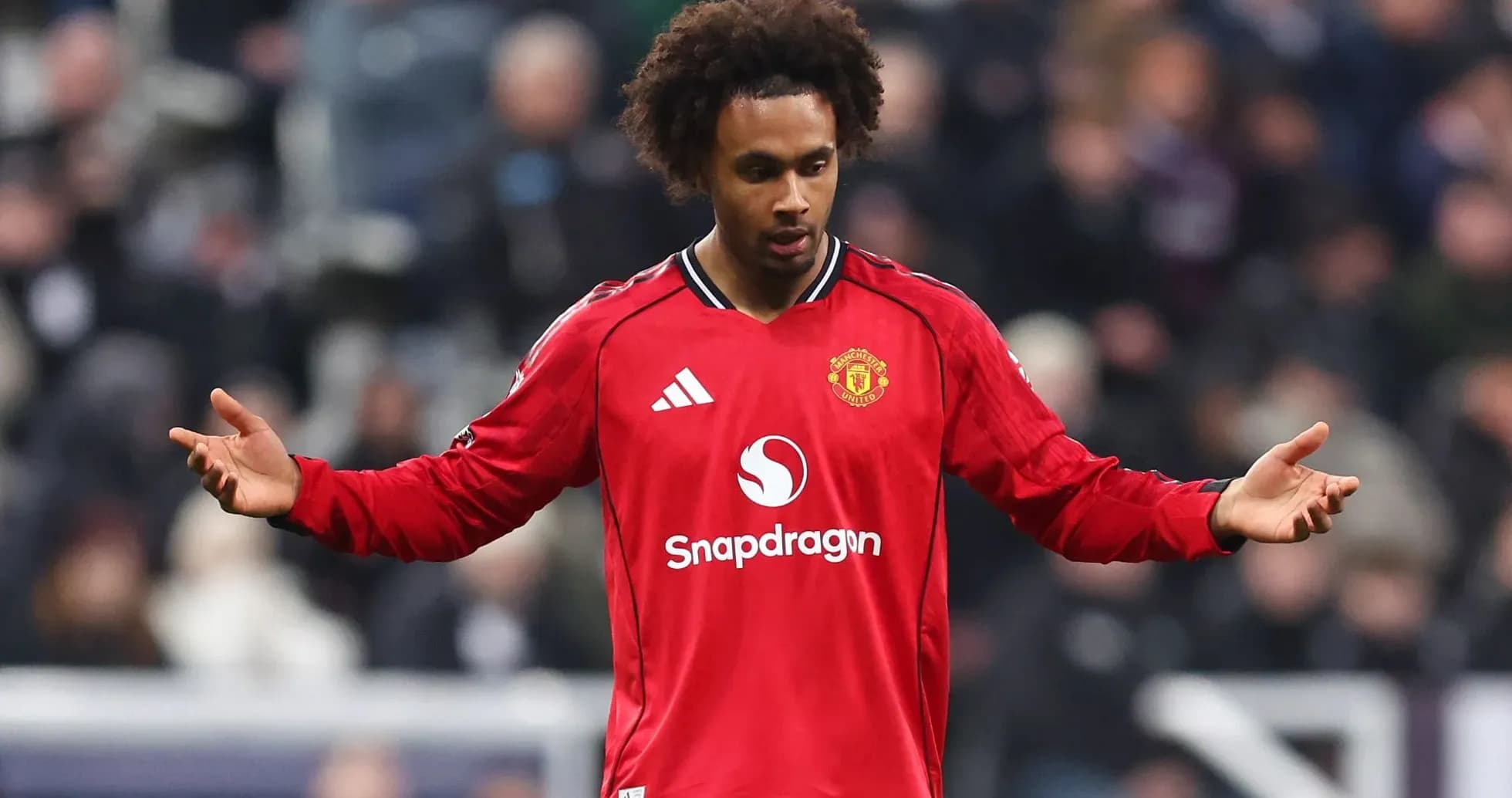 Player gesturing during a football match Player gesturing during a football match