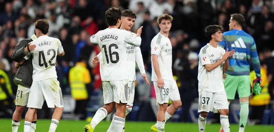 Real Madrid players celebrating after a match Real Madrid players celebrating after a match