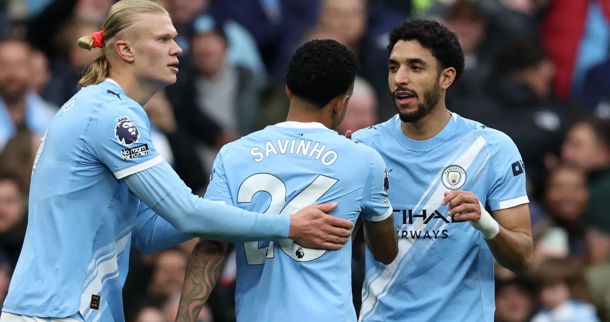 Manchester City players celebrating during match Manchester City players celebrating during match