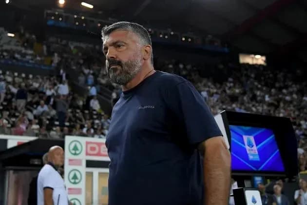 Coach standing near sidelines during a match Coach standing near sidelines during a match