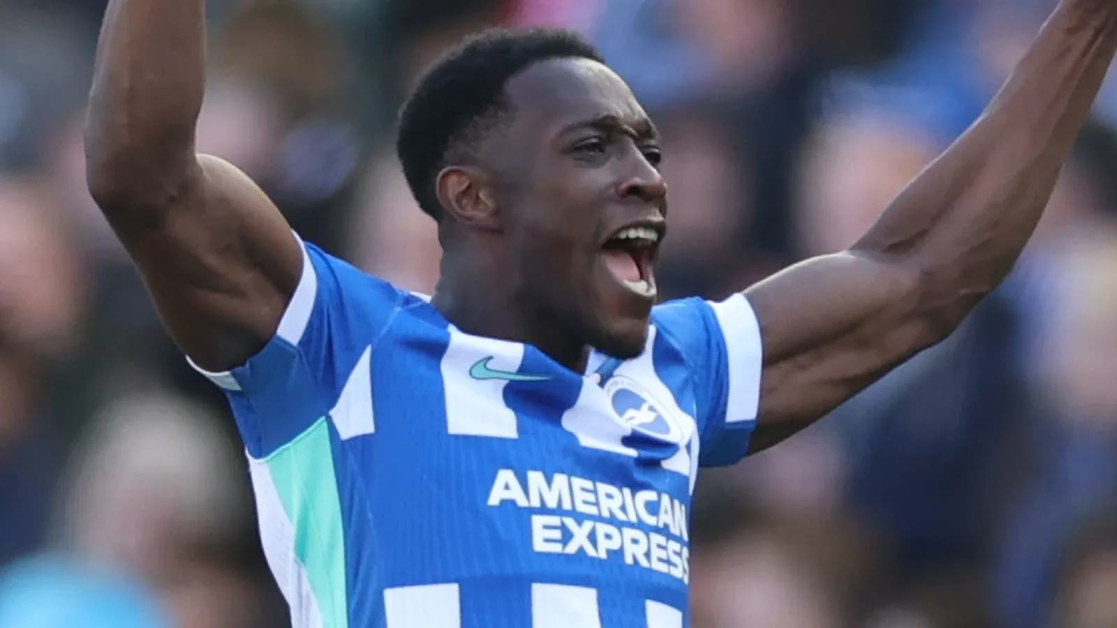Player celebrating a goal in blue team jersey Player celebrating a goal in blue team jersey
