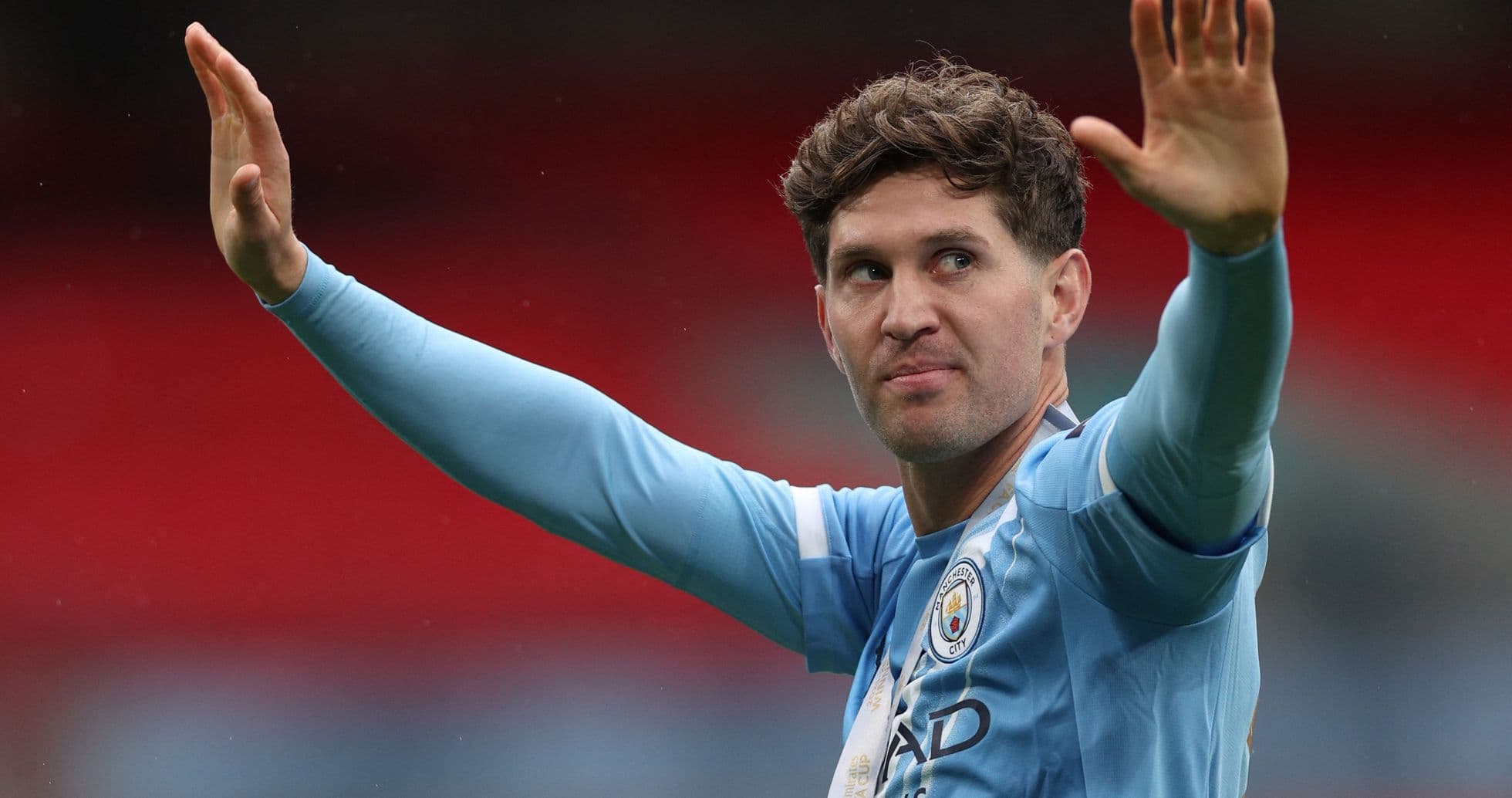 Player waving to fans during match celebration Player waving to fans during match celebration