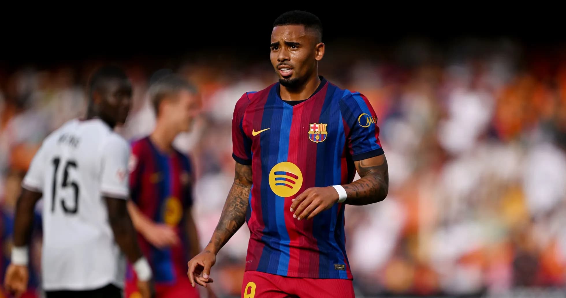 Barcelona player walking on the pitch during match Barcelona player walking on the pitch during match
