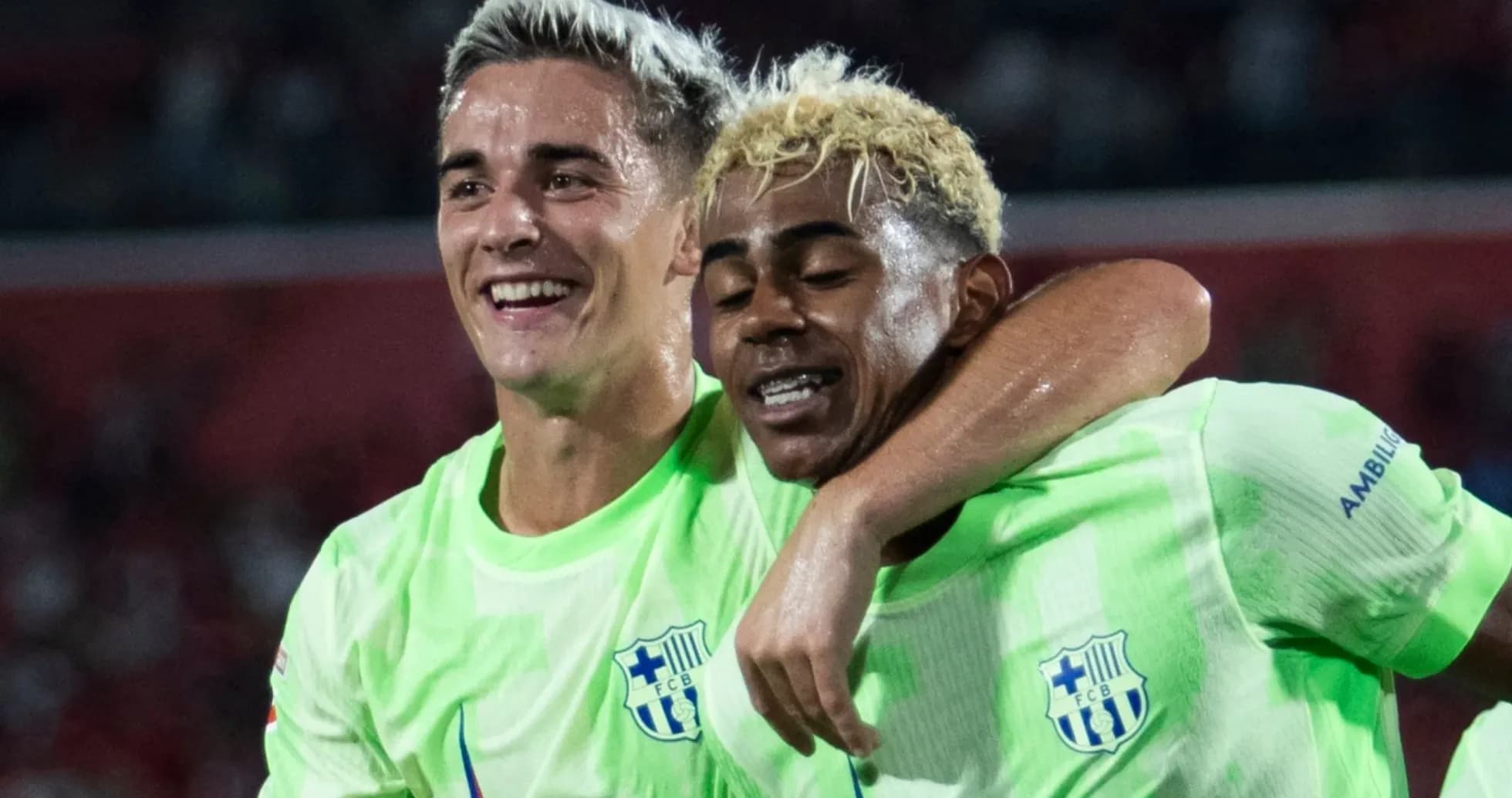 Two players celebrating together after a match Two players celebrating together after a match