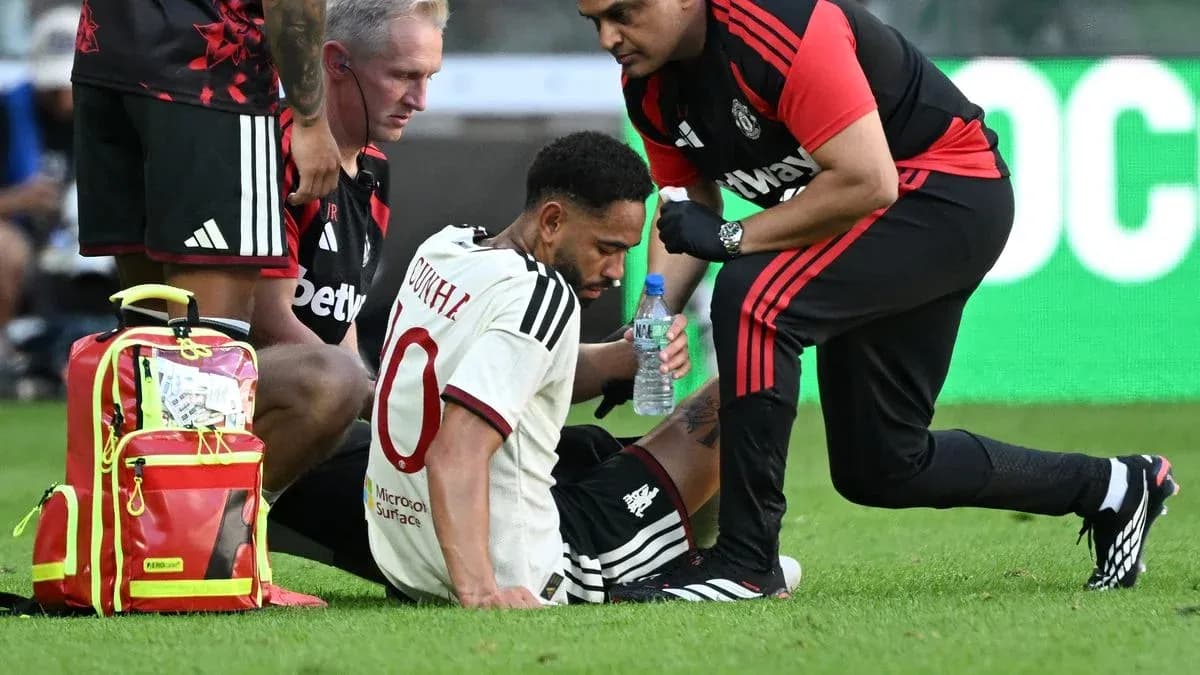 Player receiving medical attention on the field Player receiving medical attention on the field