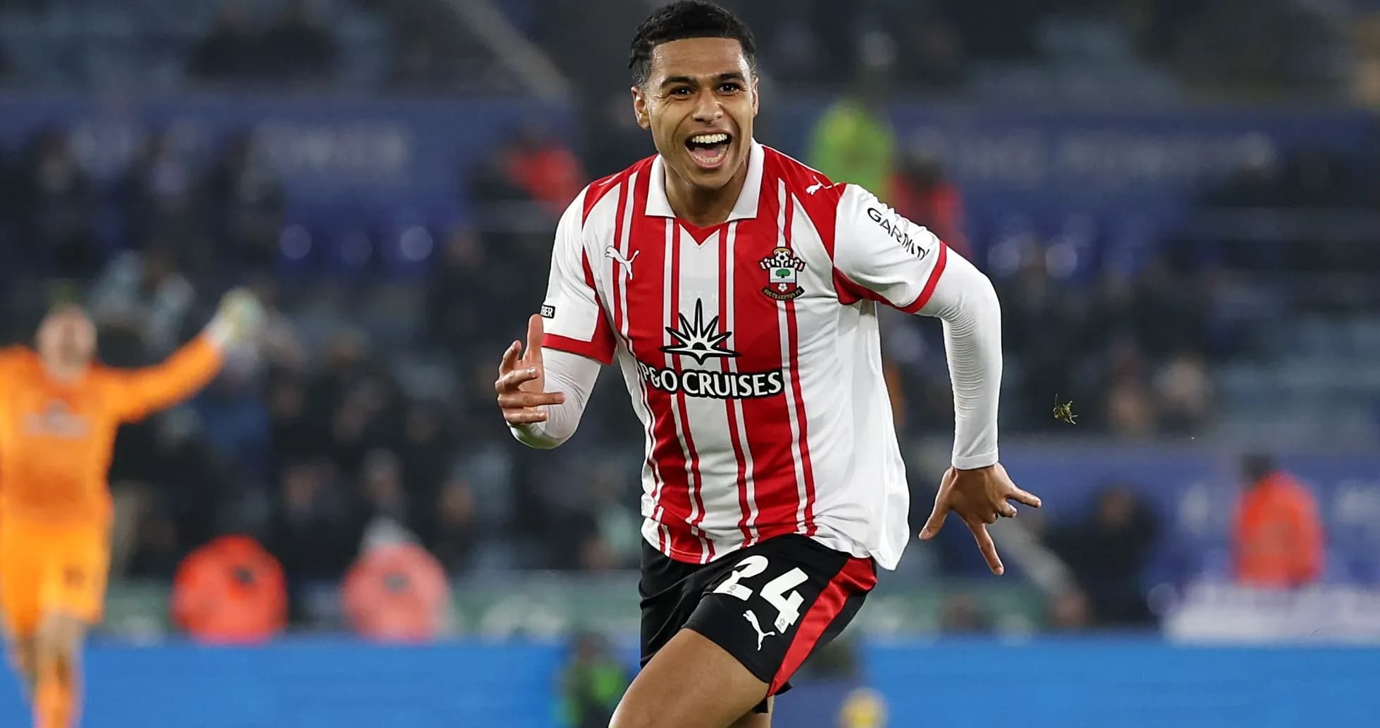 Player celebrating a goal in Southampton jersey Player celebrating a goal in Southampton jersey