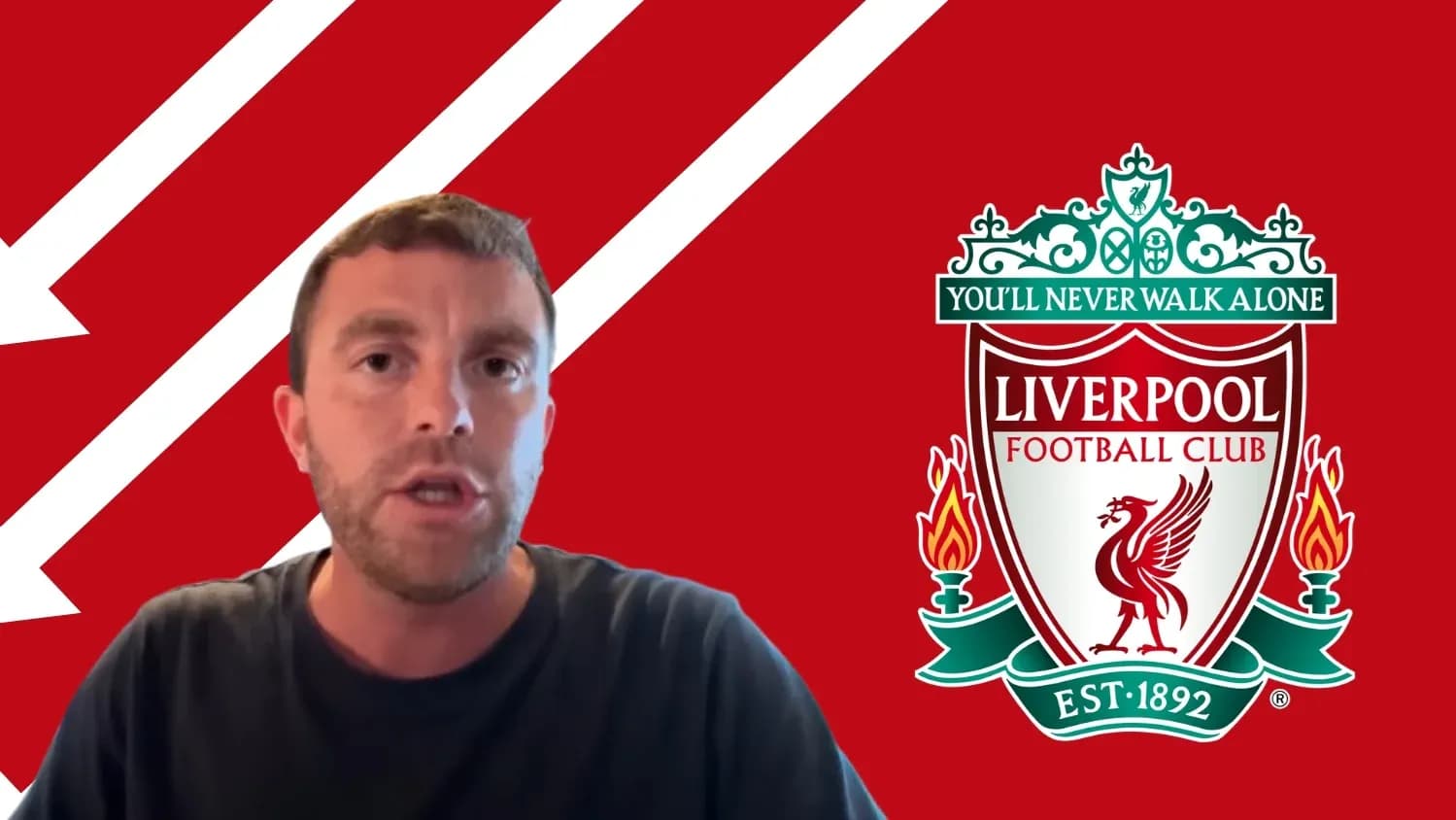 Person speaking with Liverpool FC logo in background Person speaking with Liverpool FC logo in background