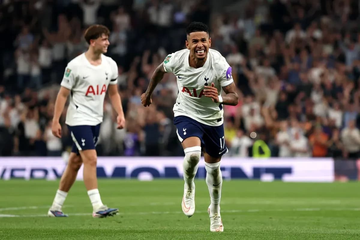 Tottenham players celebrating a goal during match Tottenham players celebrating a goal during match
