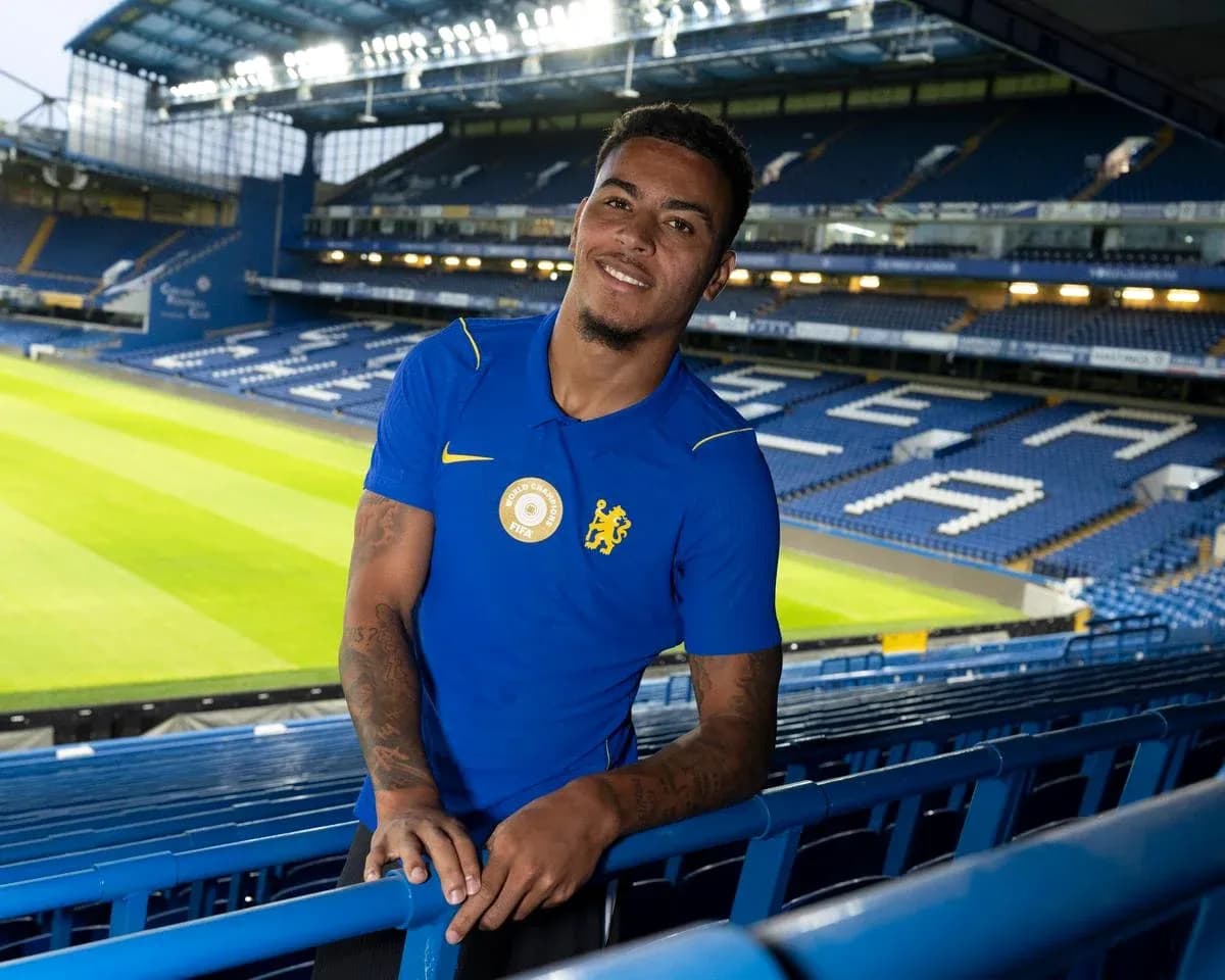 Player posing in Chelsea FC stadium stands Player posing in Chelsea FC stadium stands