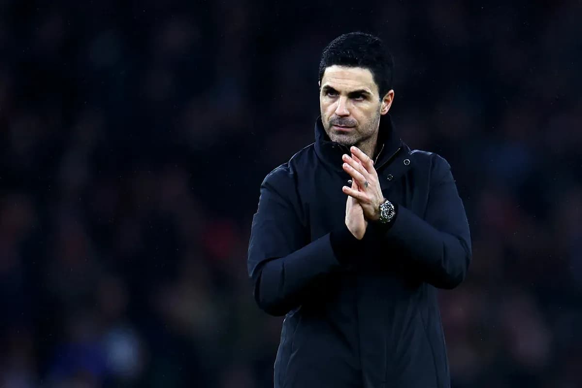 Manager clapping in a dark jacket on field Manager clapping in a dark jacket on field