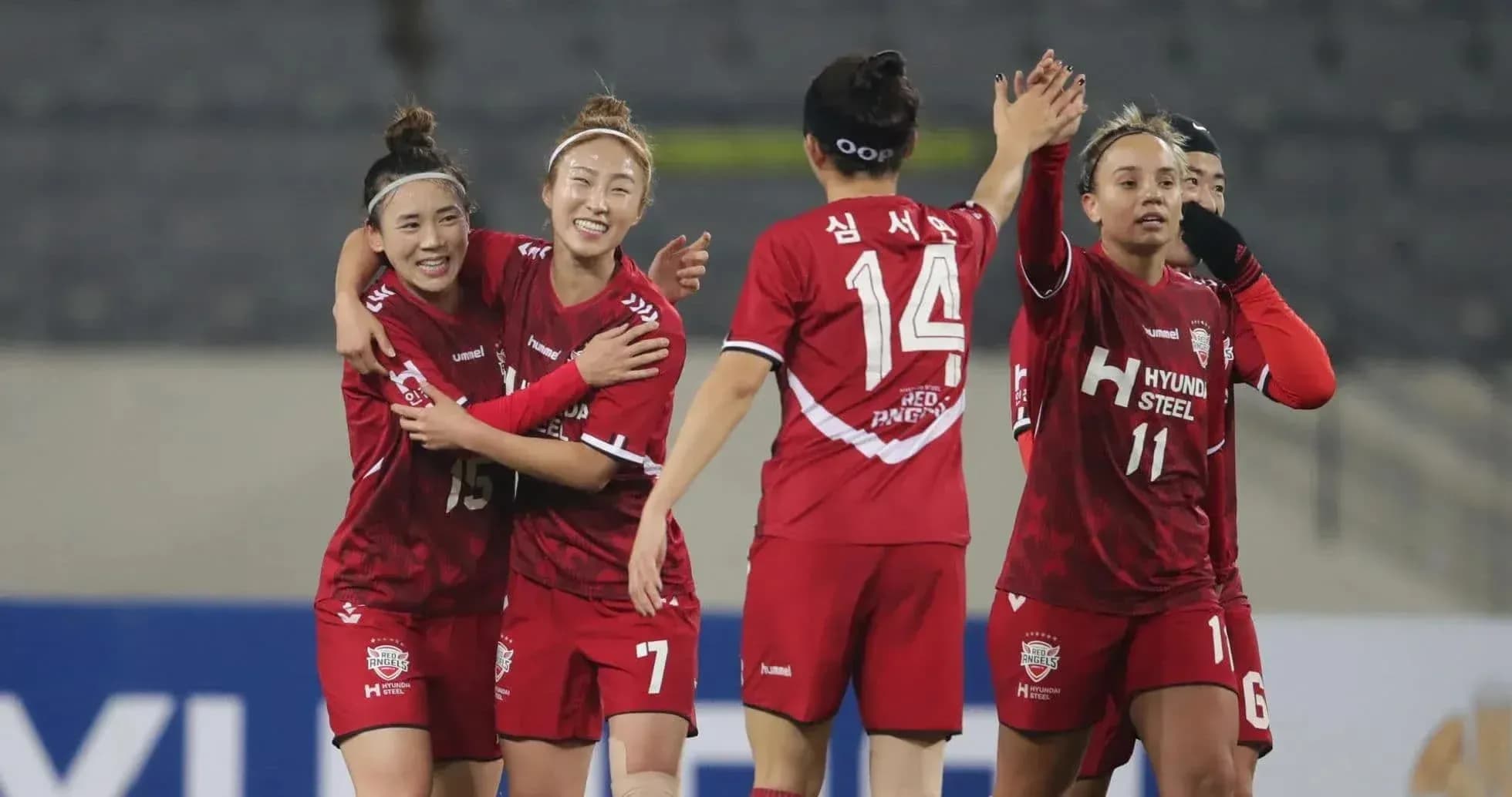 Hwacheon KSPO W players celebrating a goal Hwacheon KSPO W players celebrating a goal