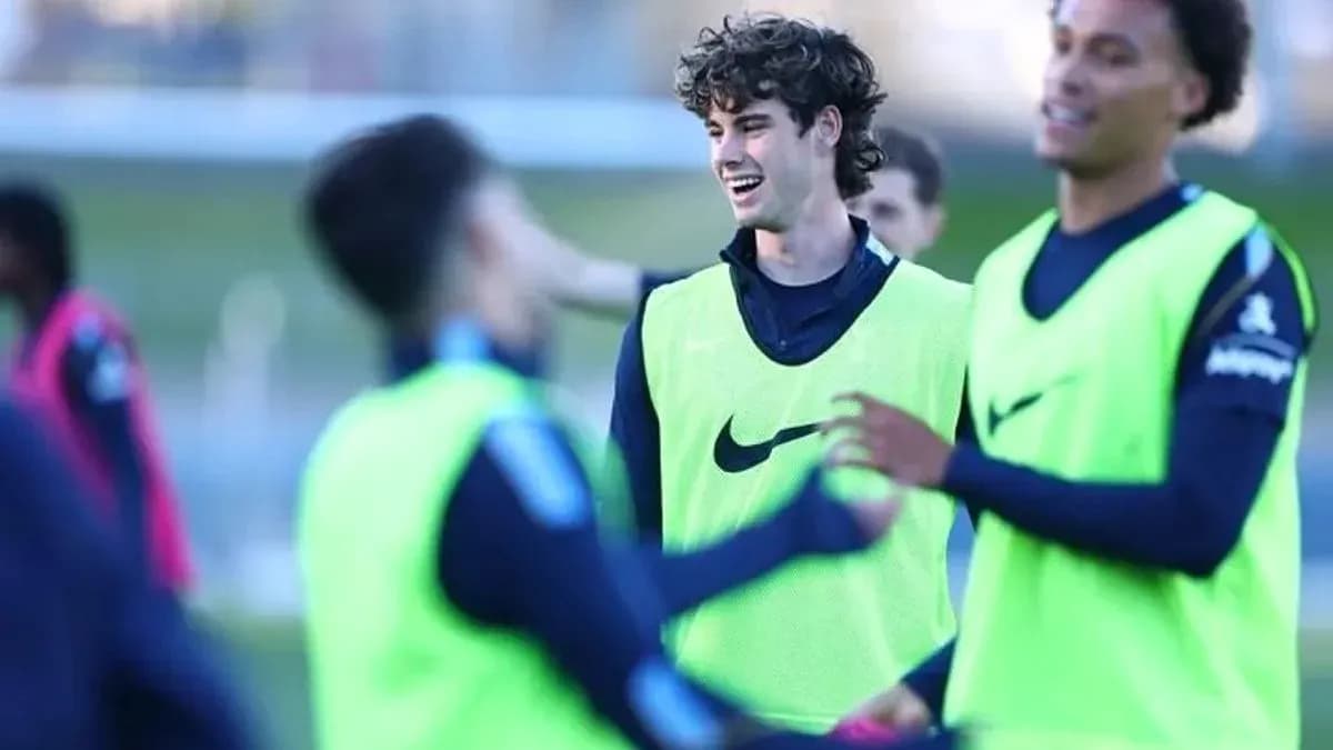 Players laughing and interacting during training session Players laughing and interacting during training session