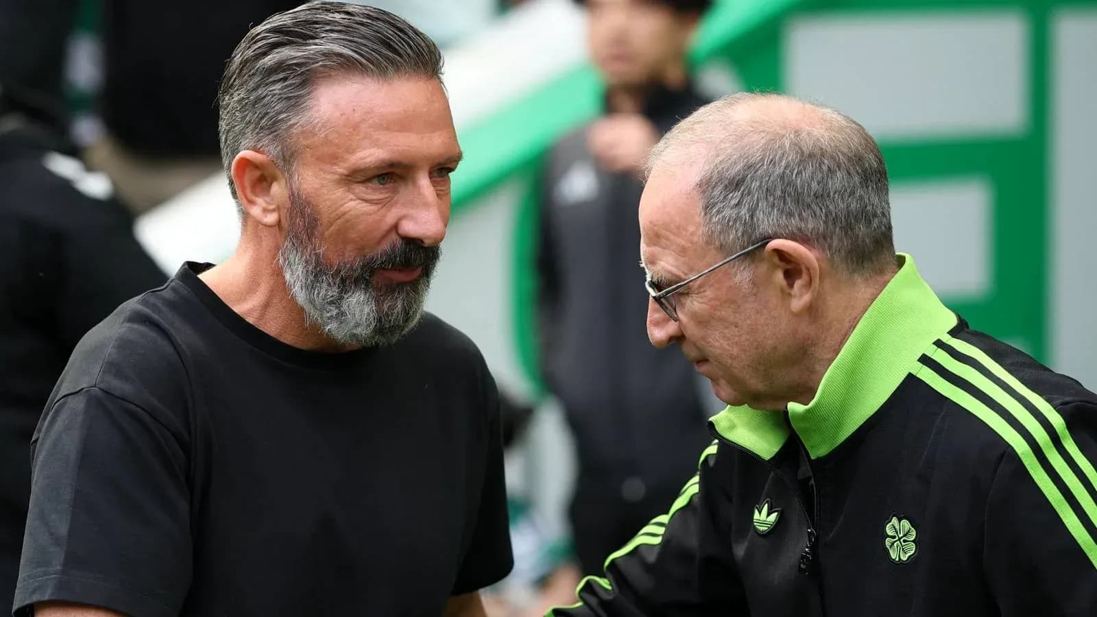 Two football managers greeting each other before match Two football managers greeting each other before match