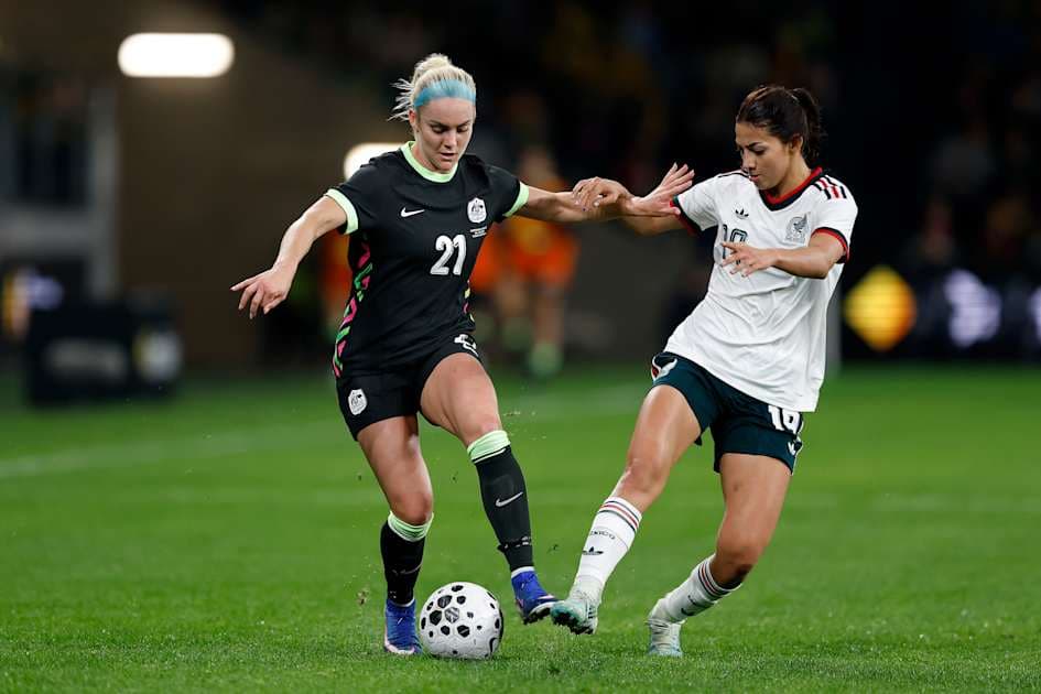 Two players battling for the ball during soccer match Two players battling for the ball during soccer match