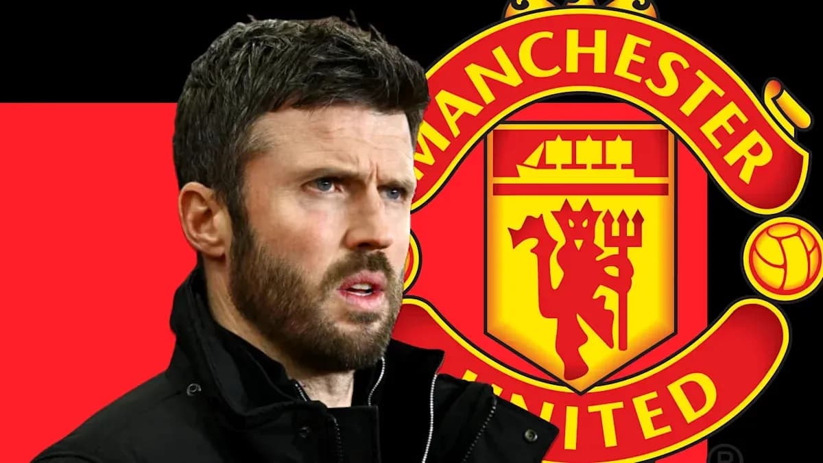 Man with beard in front of Manchester United logo Man with beard in front of Manchester United logo