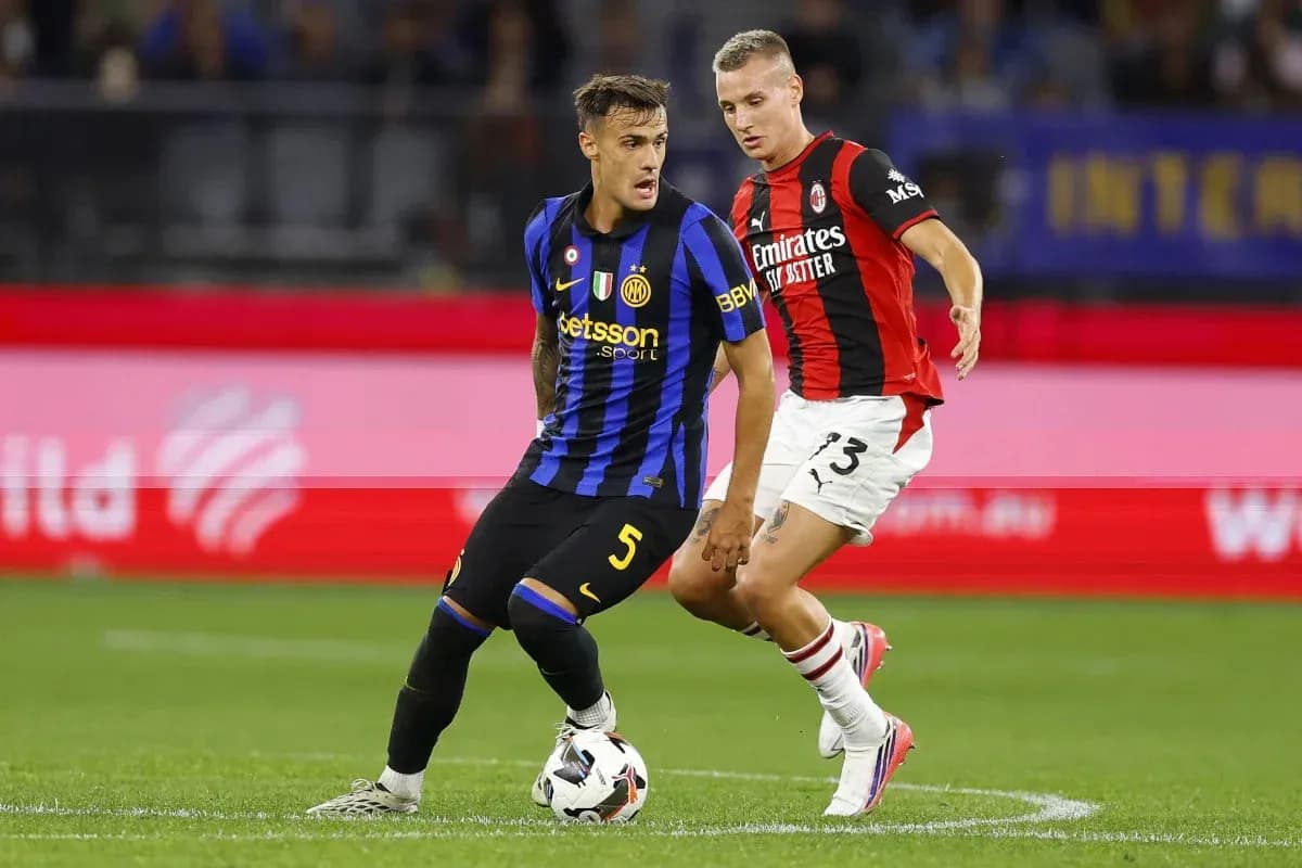 Player dribbling the ball during match between teams Player dribbling the ball during match between teams