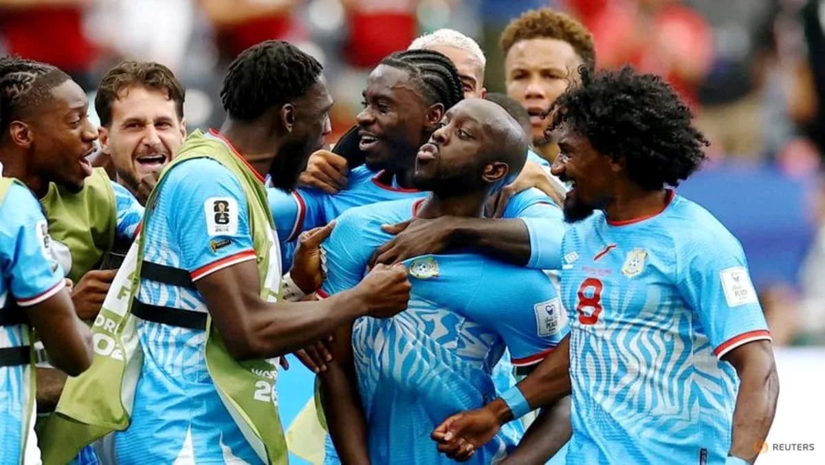 Players celebrating a goal during a match Players celebrating a goal during a match