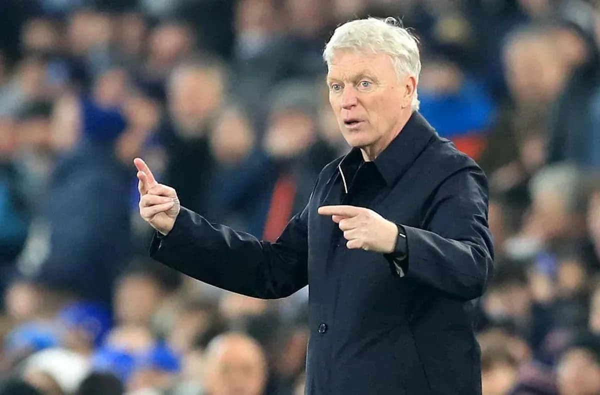 Manager directing players during a match Manager directing players during a match