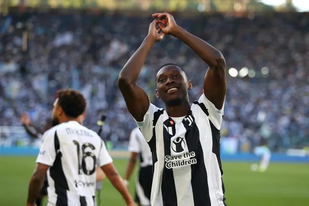Player celebrating with fans after the match Player celebrating with fans after the match