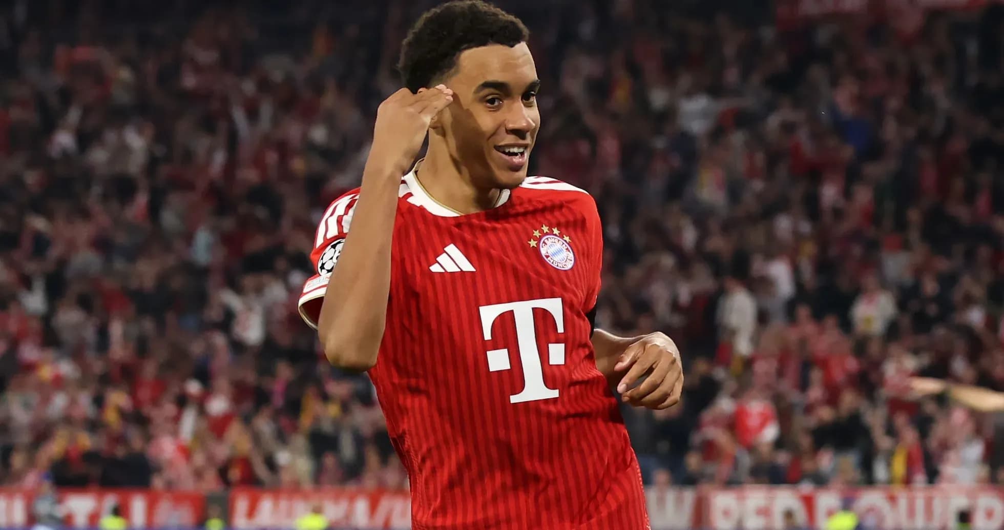 Player celebrating goal for Bayern Munich in stadium Player celebrating goal for Bayern Munich in stadium