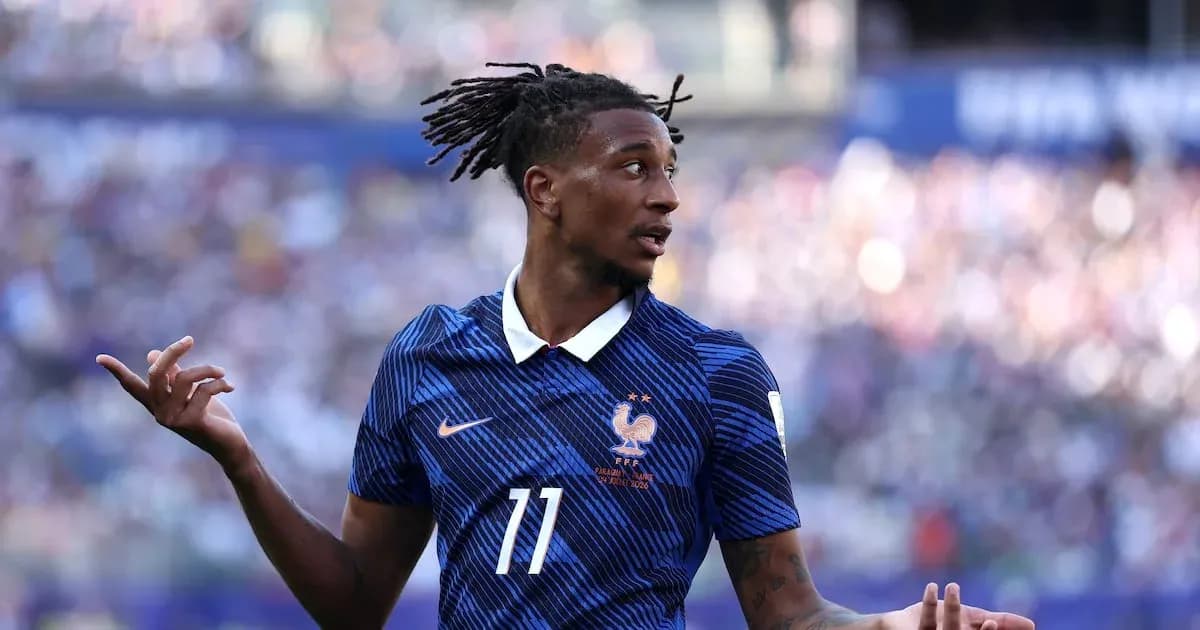 Player in France jersey gesturing during match Player in France jersey gesturing during match